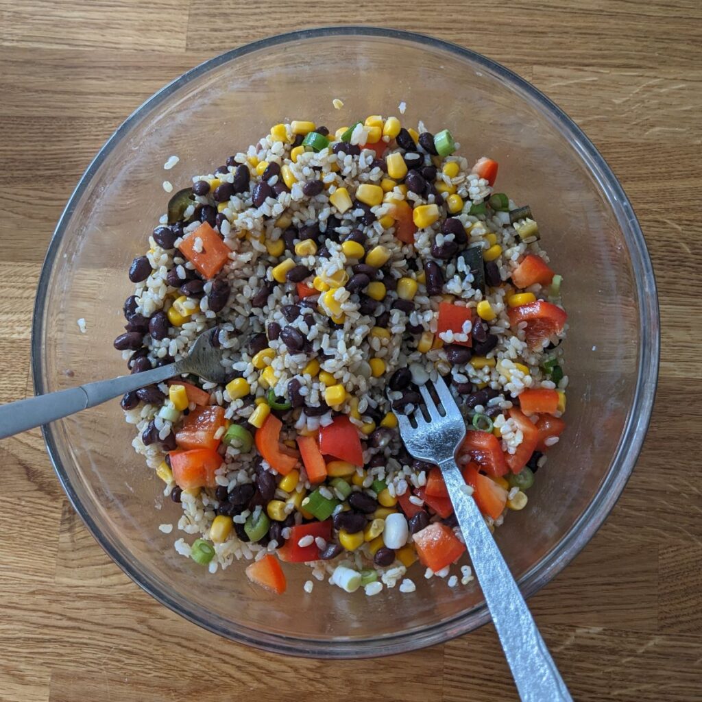 Brown rice salad with black beans, sweetcorn and bell pepper