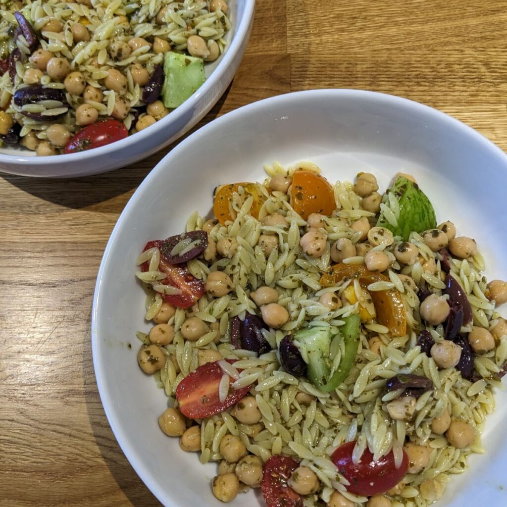 Orzo pasta with tomatoes and pesto